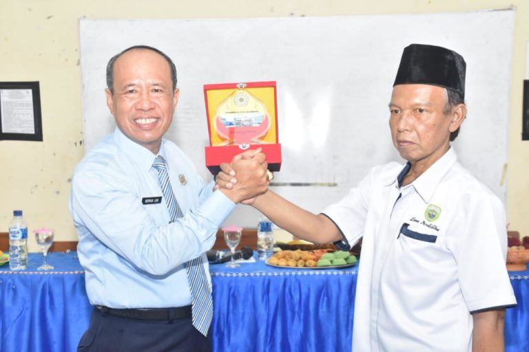 Kepsek SMAN I Tanjung Lago Tingkatkan SDM Melalui MoU Dengan Rektor Universitas PGRI Palembang